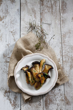 Plate of fried king trumpet mushrooms