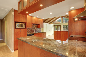 Beautiful kitchen with marble counters.