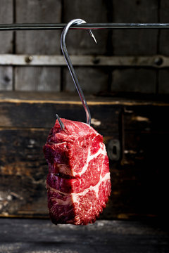 Raw beef on meat hook