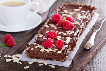Vegan chocolate tart with almonds