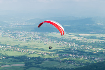 Paragliding over village