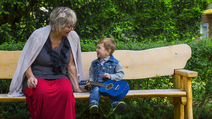 Grandmother and grandson singing together