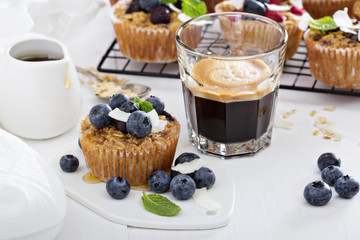 Oat muffin with coffee for breakfast
