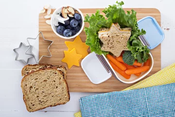 Fotobehang Lunch box with sandwich and salad © fahrwasser