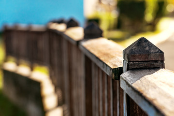 Fototapeta na wymiar Bridge detail walkway path wooden fence park outdoors dark old