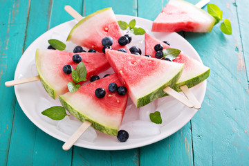 Fresh watermelon popsicles with blueberries © fahrwasser