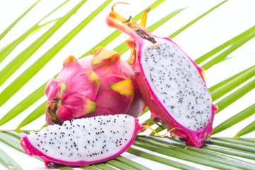 Dragon fruit on palm leaf
