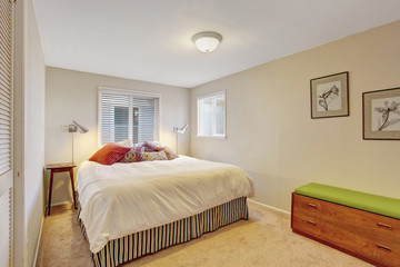 Simple room with carpet and white walls.