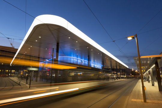 Germany, Augsburg, tram stop at Koenigsplatz in the evening