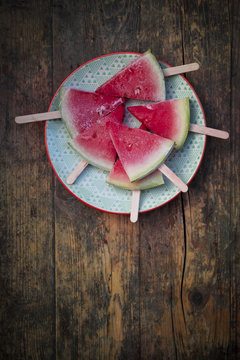 Plate of watermelon popsicles