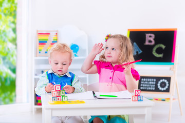 Kids at preschool painting