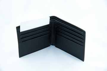 Isolated black leather wallet and a card