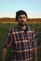 Bearded Lumberjack in a Field