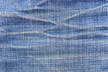 Naklejka premium Blue jean fabric for background
