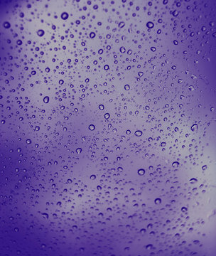 Waterdrops on a glass surface,abstract nature background