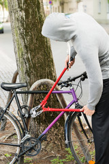 Thief Breaking The Bicycle Lock