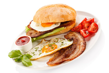 Breakfast - sandwich, egg, bacon and vegetables