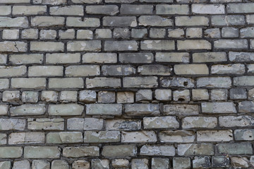fragment of the old wall masonry with white sand-lime brick