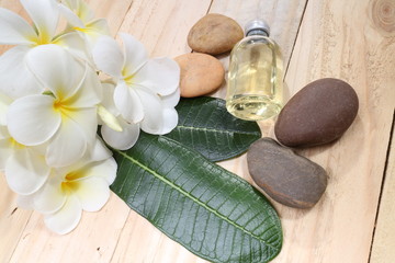 Zen spa concept background - Zen massage stones with frangipani plumeria flower