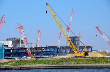 Fototapeta na wymiar Construction site of the development district. Toyosu, Tokyo, Japan