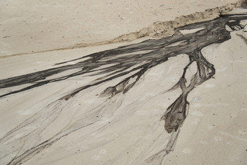 oil and sand beach