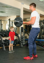 man and son in the gym