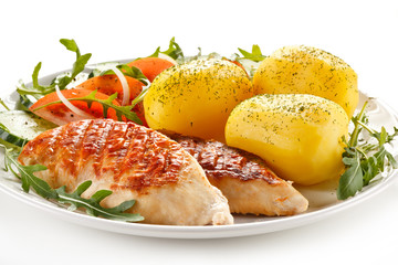 Grilled chicken fillets, boiled potatoes and vegetable salad 