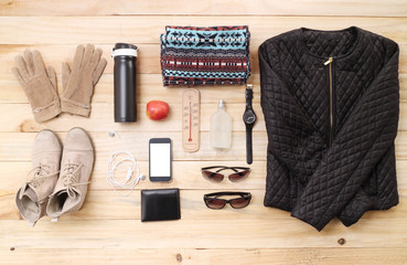 Outfit of traveler, student, teenager, young woman or guy. Overhead of essentials for modern young...