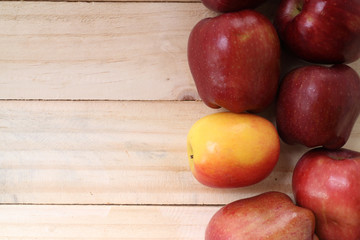 Fototapeta na wymiar Sweet apples on wooden background