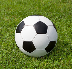 Fototapeta na wymiar Ball on the soccer field