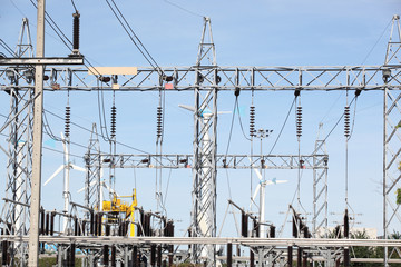 blue sky over an electrical substation.