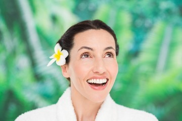 a woman with a flower in her hair