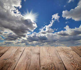 Atmosphere background. Sky and clouds with wooden board