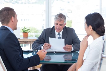 Business people in discussion in an office