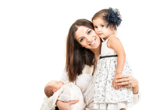 Happy mother with daughter and newborn baby  isolated