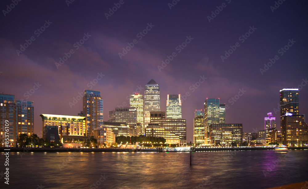 Sticker London, Canary Wharf in night with lights reflection in Thames water