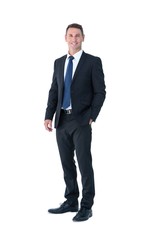 Businessman looking at camera with hand in pocket 