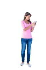 Pretty brunette using her smartphone