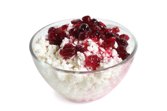 Cottage cheese with jam in glass bowl