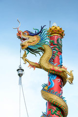 Fototapeta na wymiar Dragon pole climbing, sky background Represent greatness.