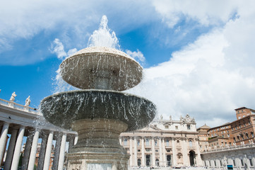 One fountain in St Peter square in Rome, Italy