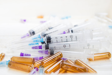 set of medical syringes and vials