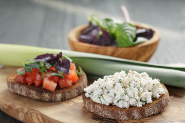 homemade bruschetta with tomatoes, basil and leek