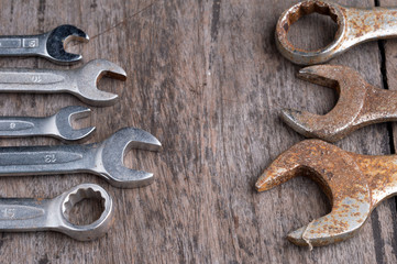 Wrench on a desk with nuts and bolt