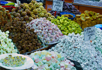 Eastern bazaar - traditional sweets.
Image of selling point at Istanbul market with piles of colorful oriental sweets