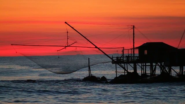 ancient fishpond sea at sunset