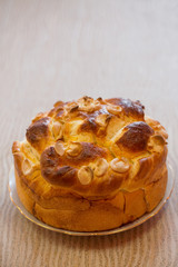 Festive baked bread on table background/Traditional food