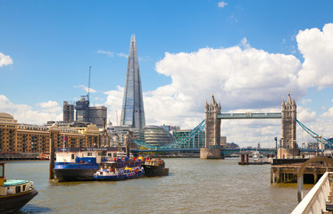 Fototapeta na wymiar LONDON, UK - APRIL 30, 2015: Shard and Tower bridge, River Thames