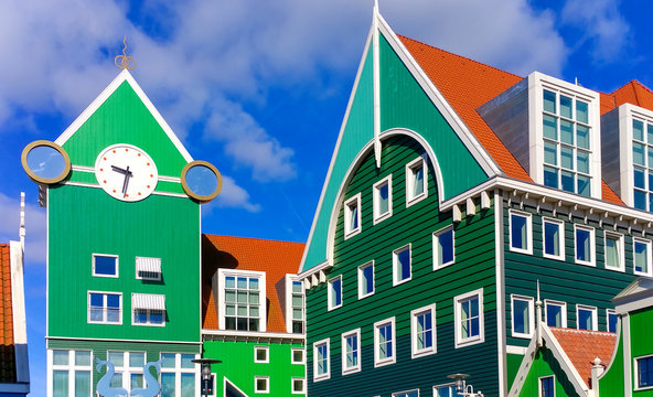 Traditional green, wooden houses in the city of Zaandam in the Netherlands, near the capital of Amsterdam. The picture was taken in june 2015.