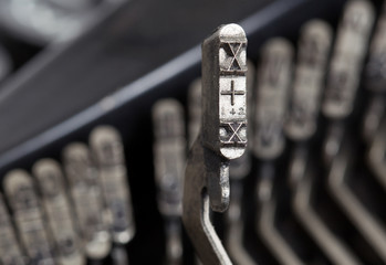 X hammer - old manual typewriter